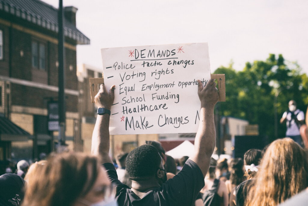 George Floyd, protesters, Minneapolis police, city streets, fires, memorials.